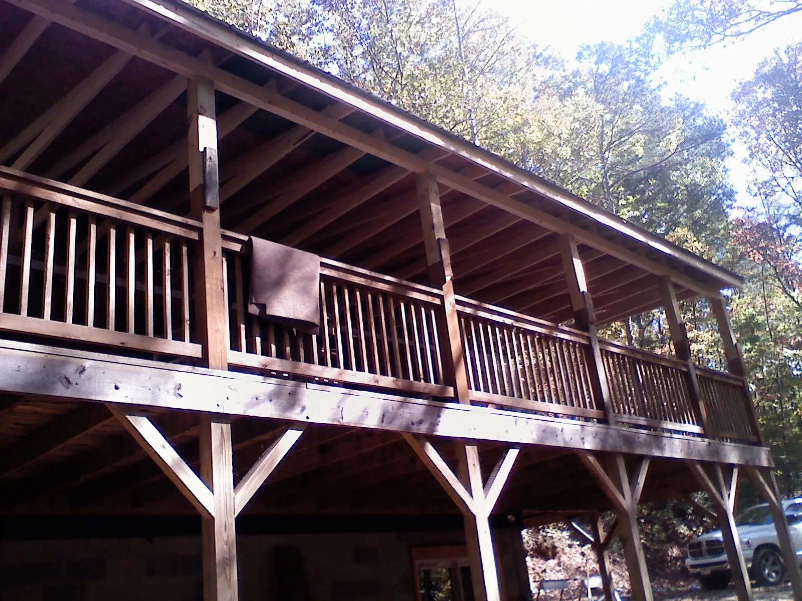 Timber framing under a new elevated porch and deck — Roof Leak Repair in Claiborne by Roofing Brothers
